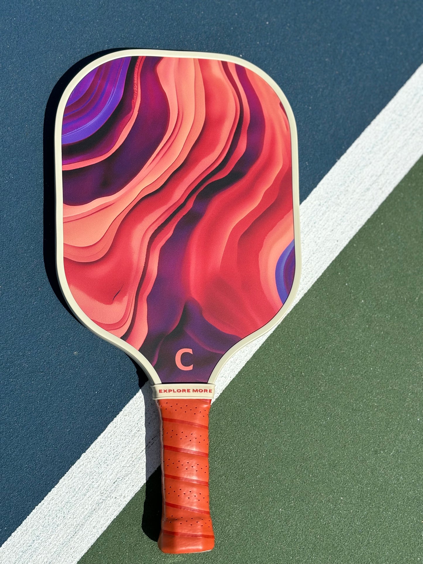 The Aurora Pickleball Paddle Front On Court